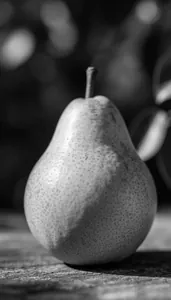 Sample photo of a pear transformed with e_grayscale